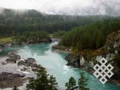 The Katun river in autumn. The river is charmingly turquoise in autumn, when silt goes down the torrential water.